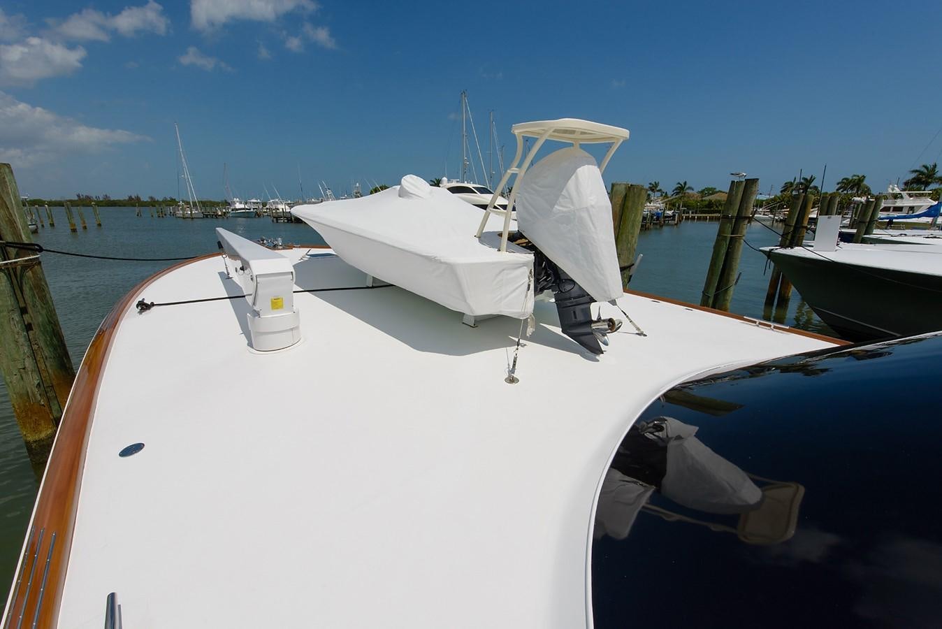 a boat docked at a pier aboard BANGARANG Yacht for Sale