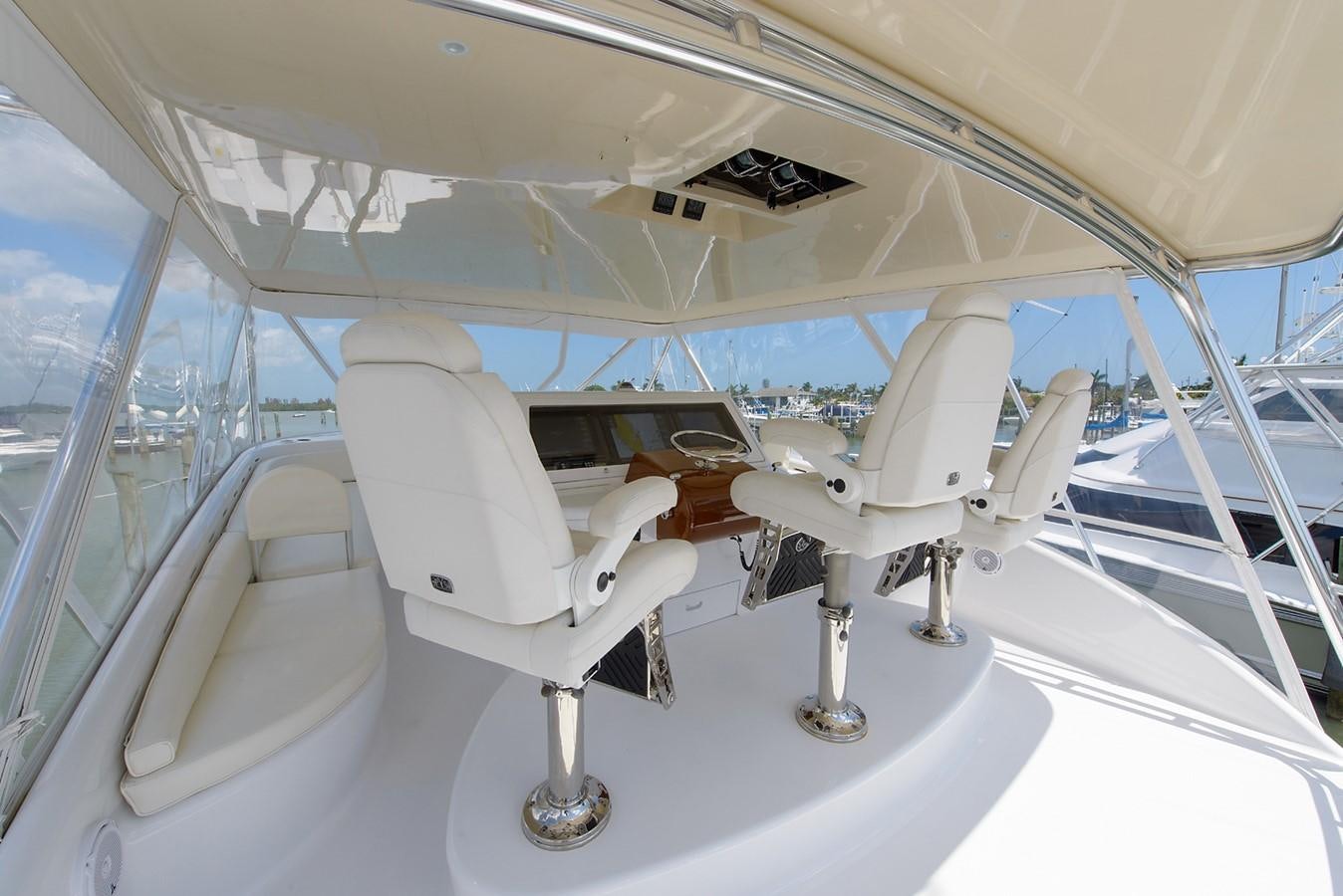 a white chair in a room aboard BANGARANG Yacht for Sale