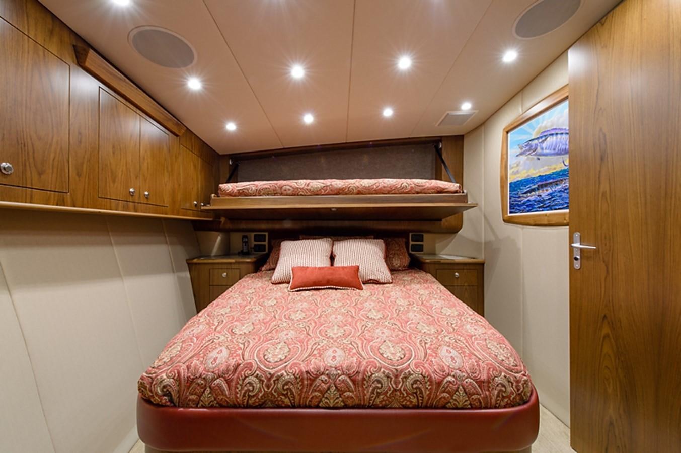 a bed with pink sheets aboard BANGARANG Yacht for Sale