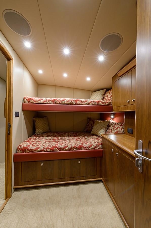 a bed in a room aboard BANGARANG Yacht for Sale