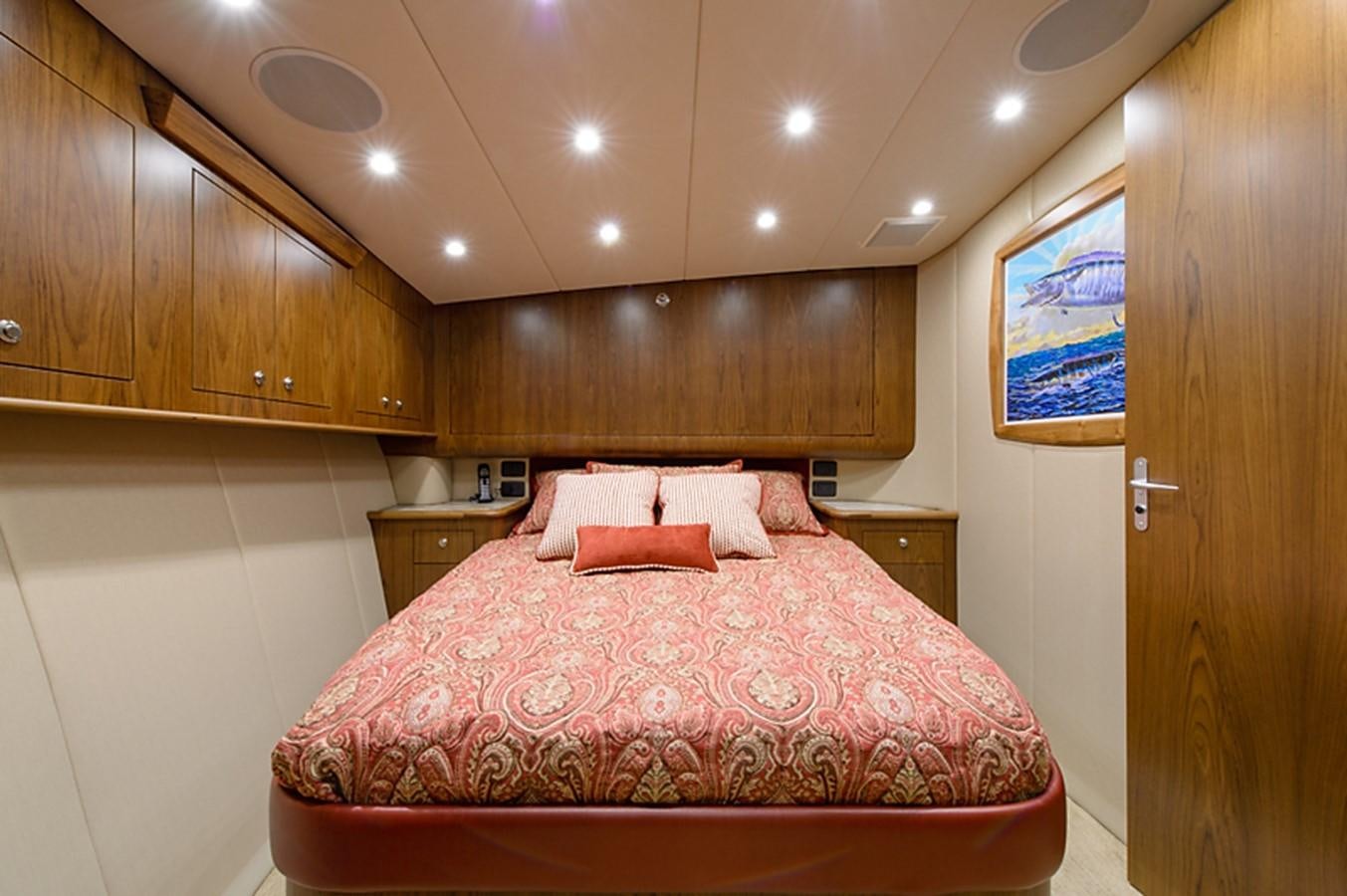 a bed in a room aboard BANGARANG Yacht for Sale