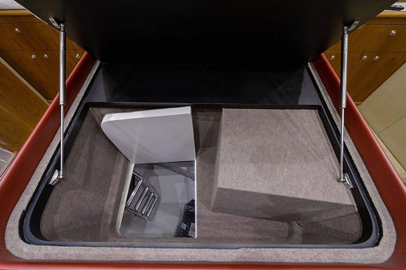 a black and silver piano aboard BANGARANG Yacht for Sale