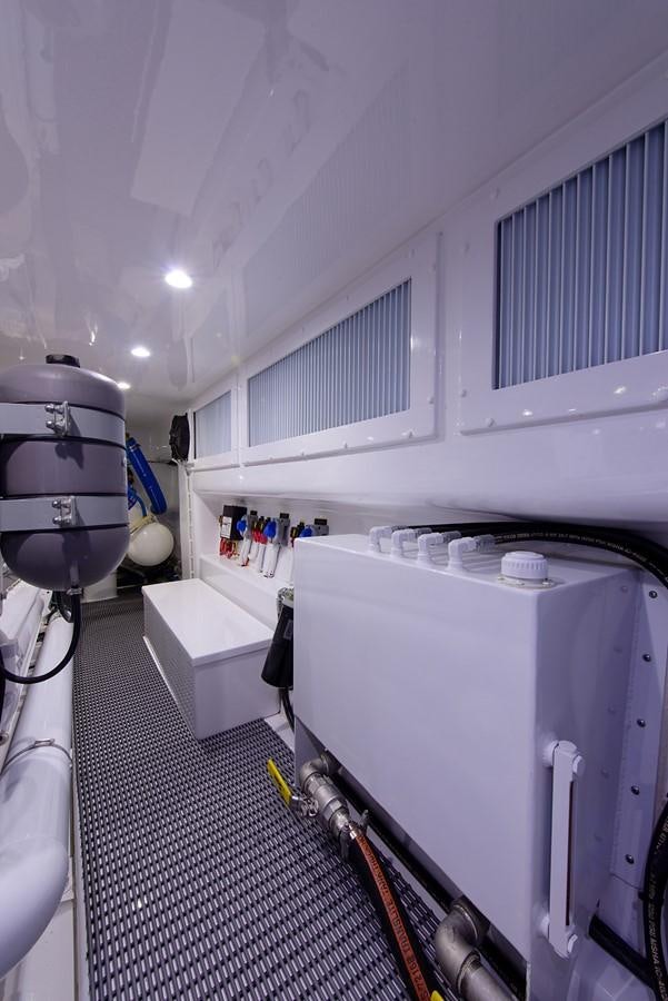 a large white room with a large white sink and a large white shelf aboard BANGARANG Yacht for Sale