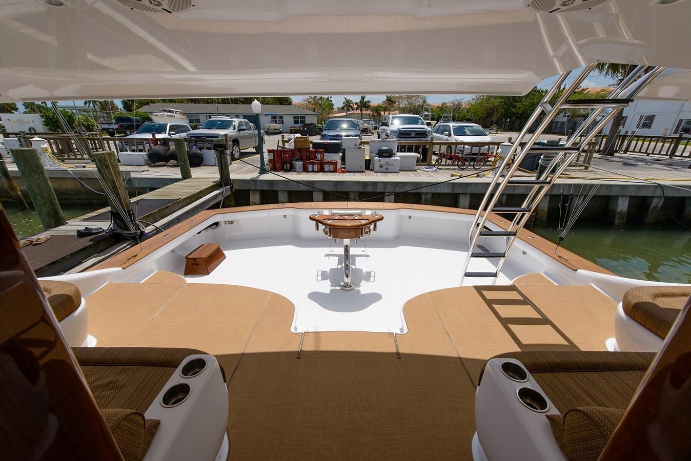 a room with a table and chairs aboard BANGARANG Yacht for Sale