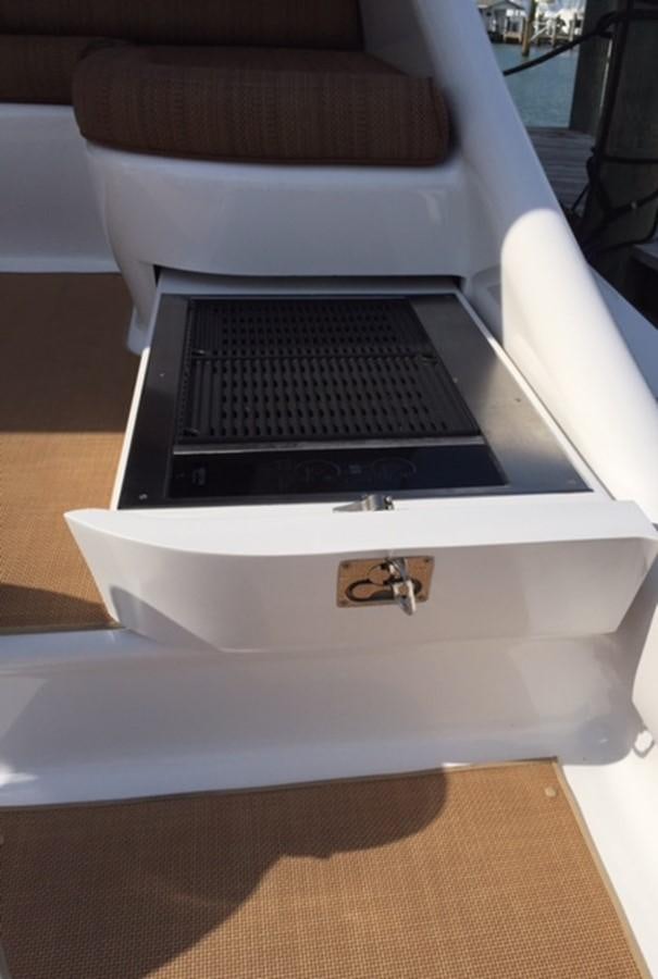 a white box with a laptop inside aboard BANGARANG Yacht for Sale