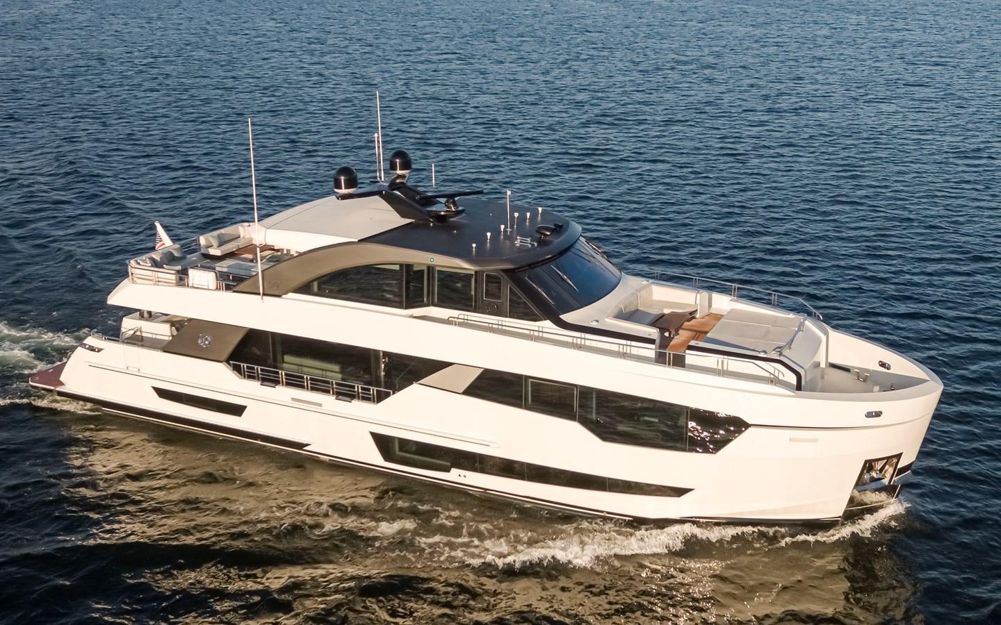 a white boat on the beach aboard 90R03 Yacht for Sale