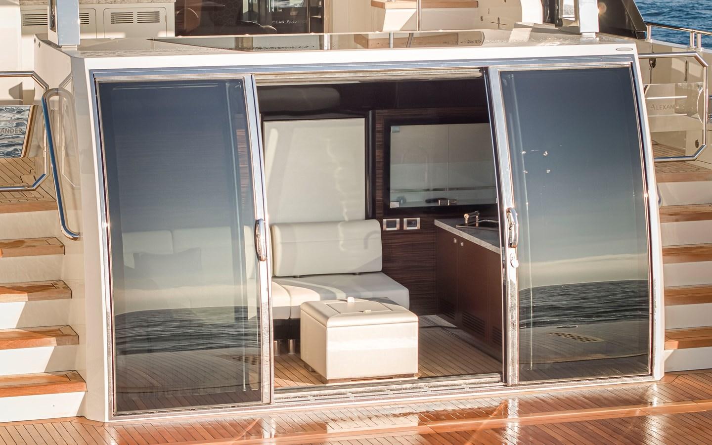 a large glass door with a glass door open aboard 90R03 Yacht for Sale