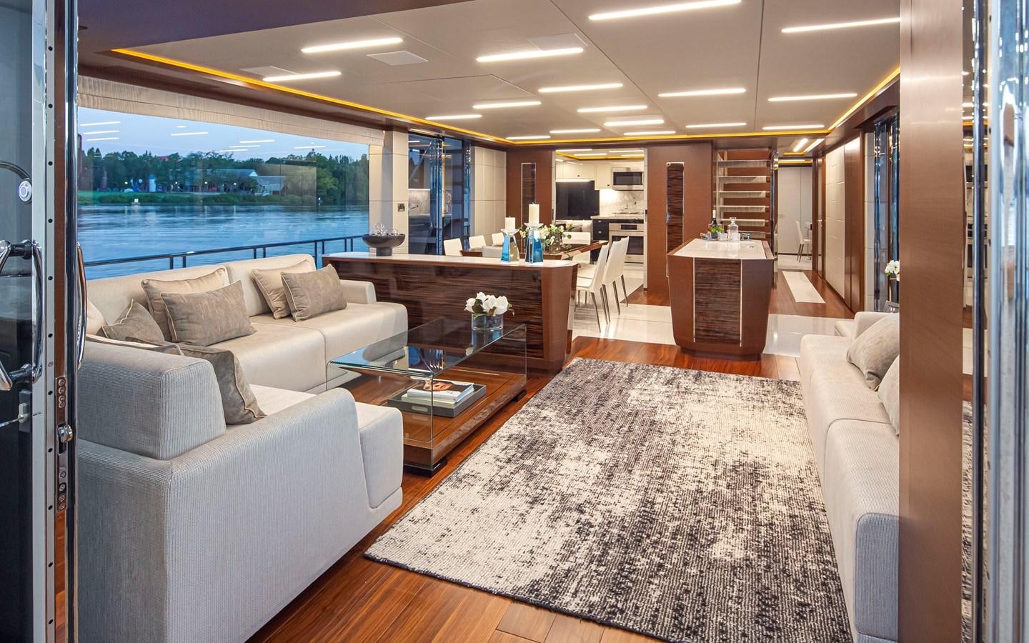a living room with a large window aboard 90R03 Yacht for Sale