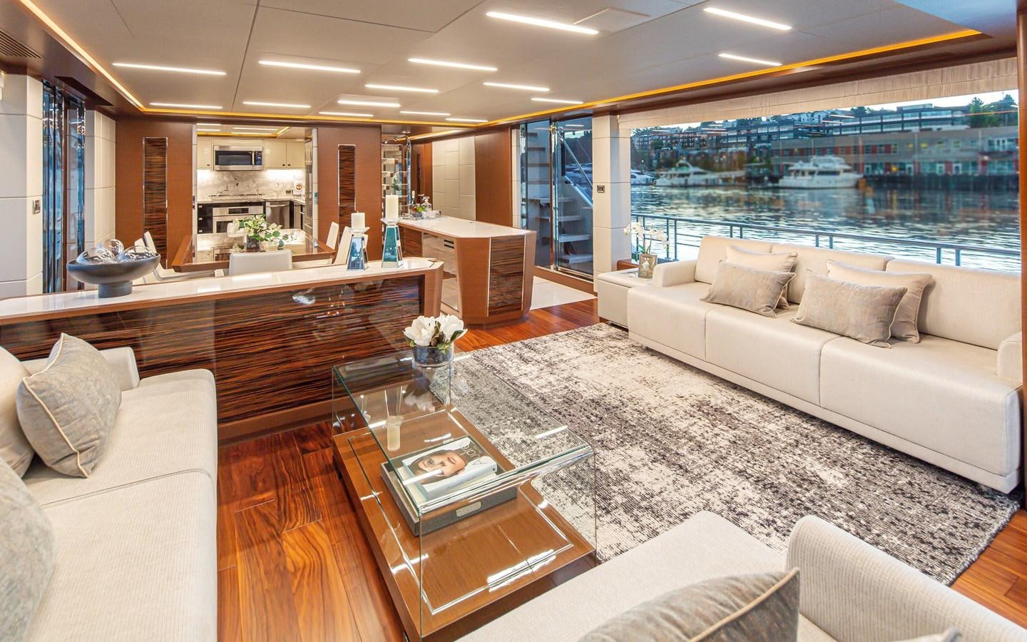 a living room with a large window aboard 90R03 Yacht for Sale