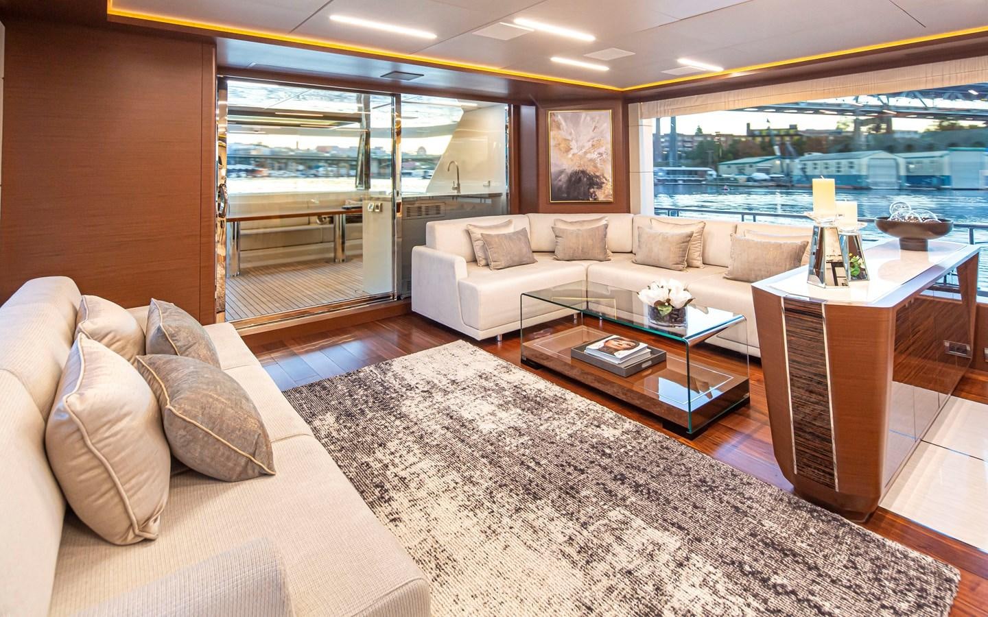 a living room with a large window aboard 90R03 Yacht for Sale