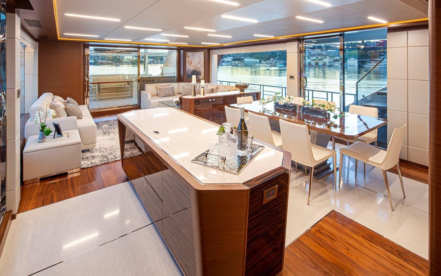 a large kitchen and living room aboard 90R03 Yacht for Sale