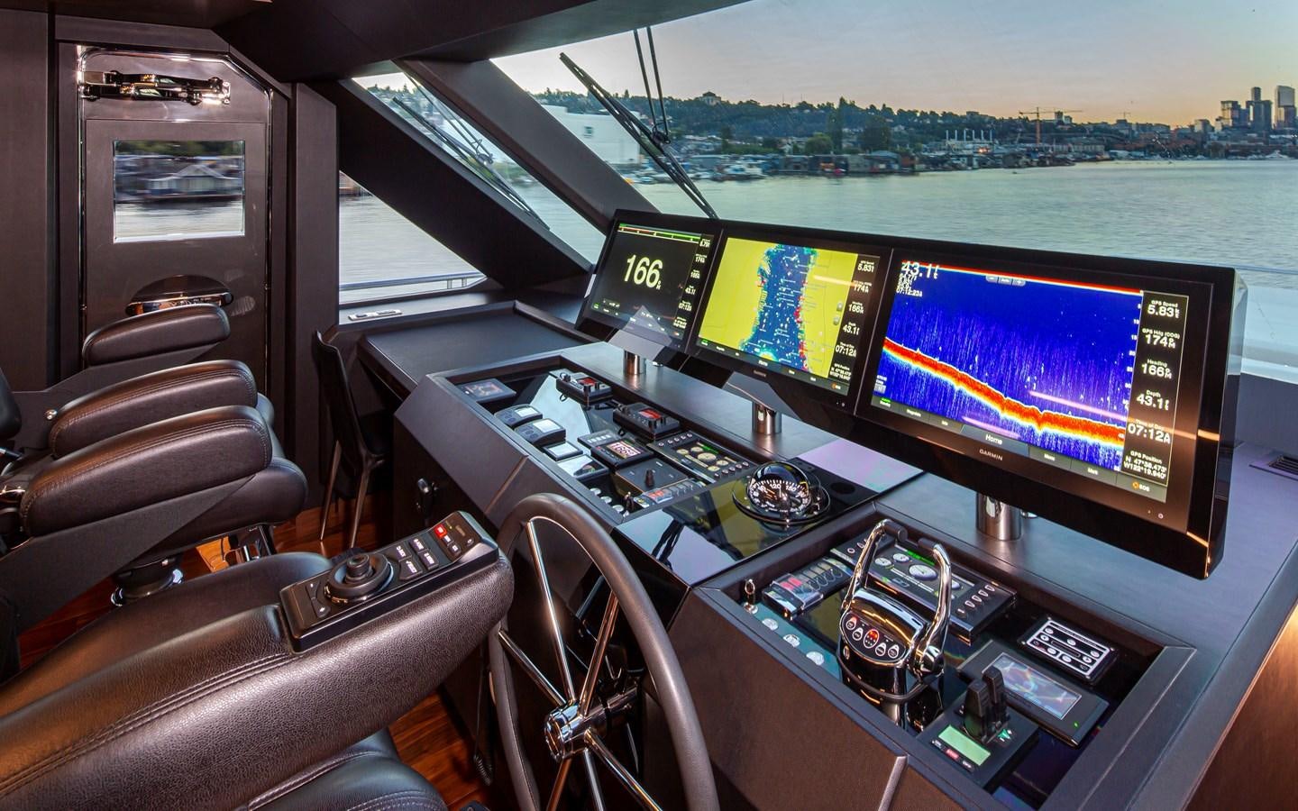 inside of a car aboard 90R03 Yacht for Sale