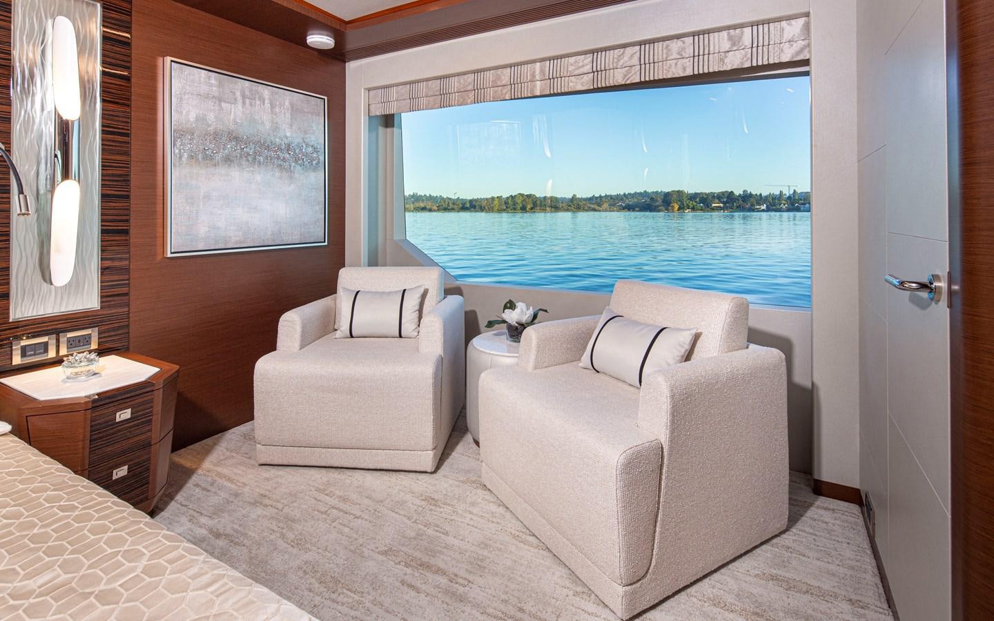 a room with a bed and a window aboard 90R03 Yacht for Sale