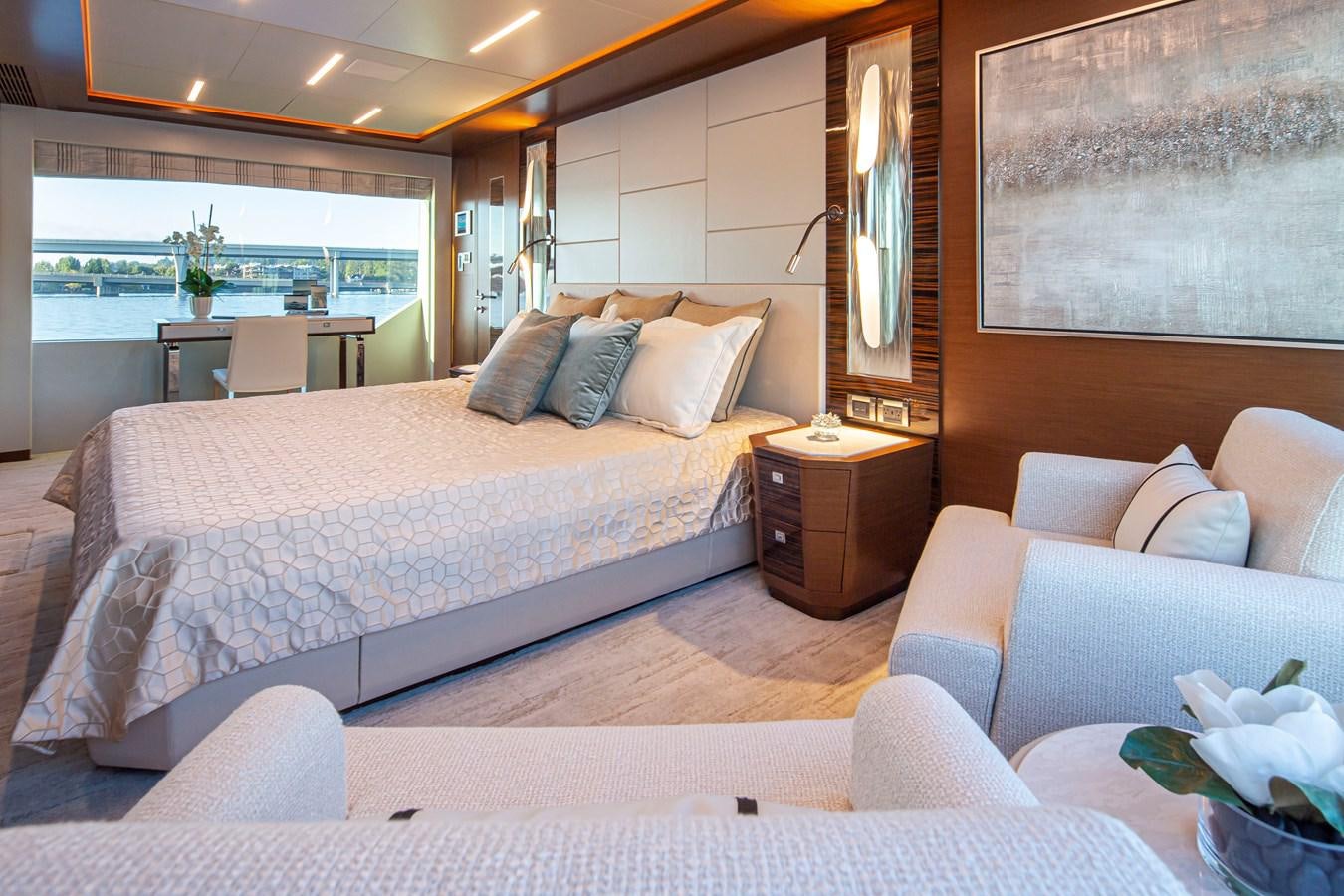 a large bed in a room aboard 90R03 Yacht for Sale