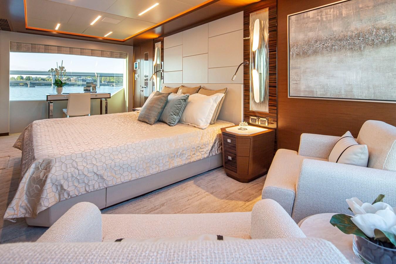 a large bed in a room aboard 90R03 Yacht for Sale