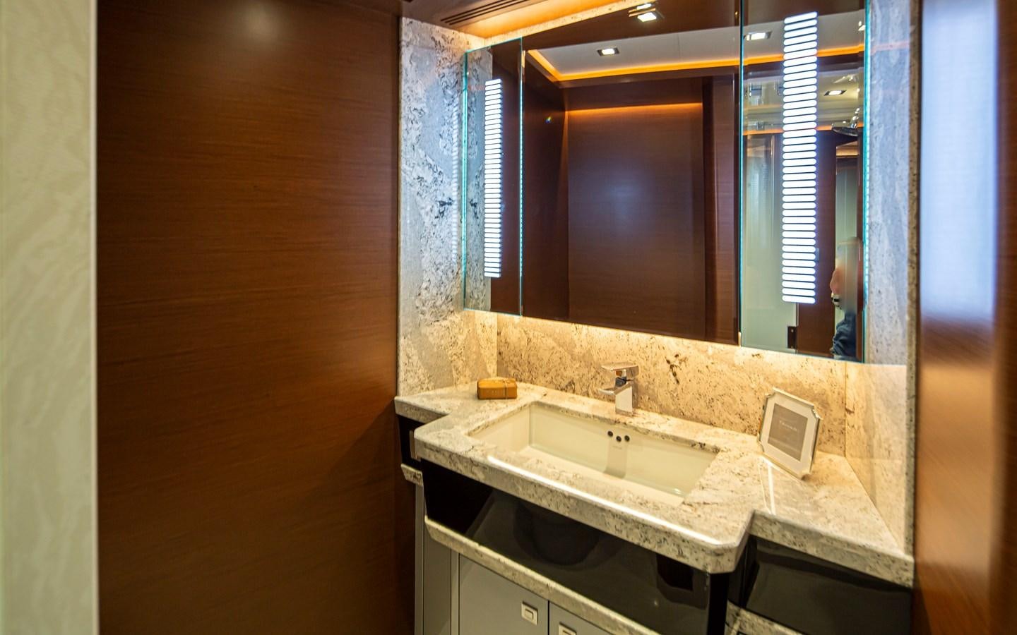 a bathroom with two sinks aboard 90R03 Yacht for Sale