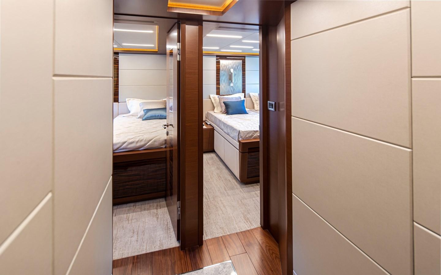 a room with a bed and a mirror aboard 90R03 Yacht for Sale
