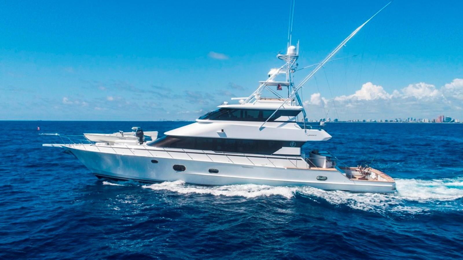 a white yacht in the water aboard GRAND LEGACY Yacht for Sale