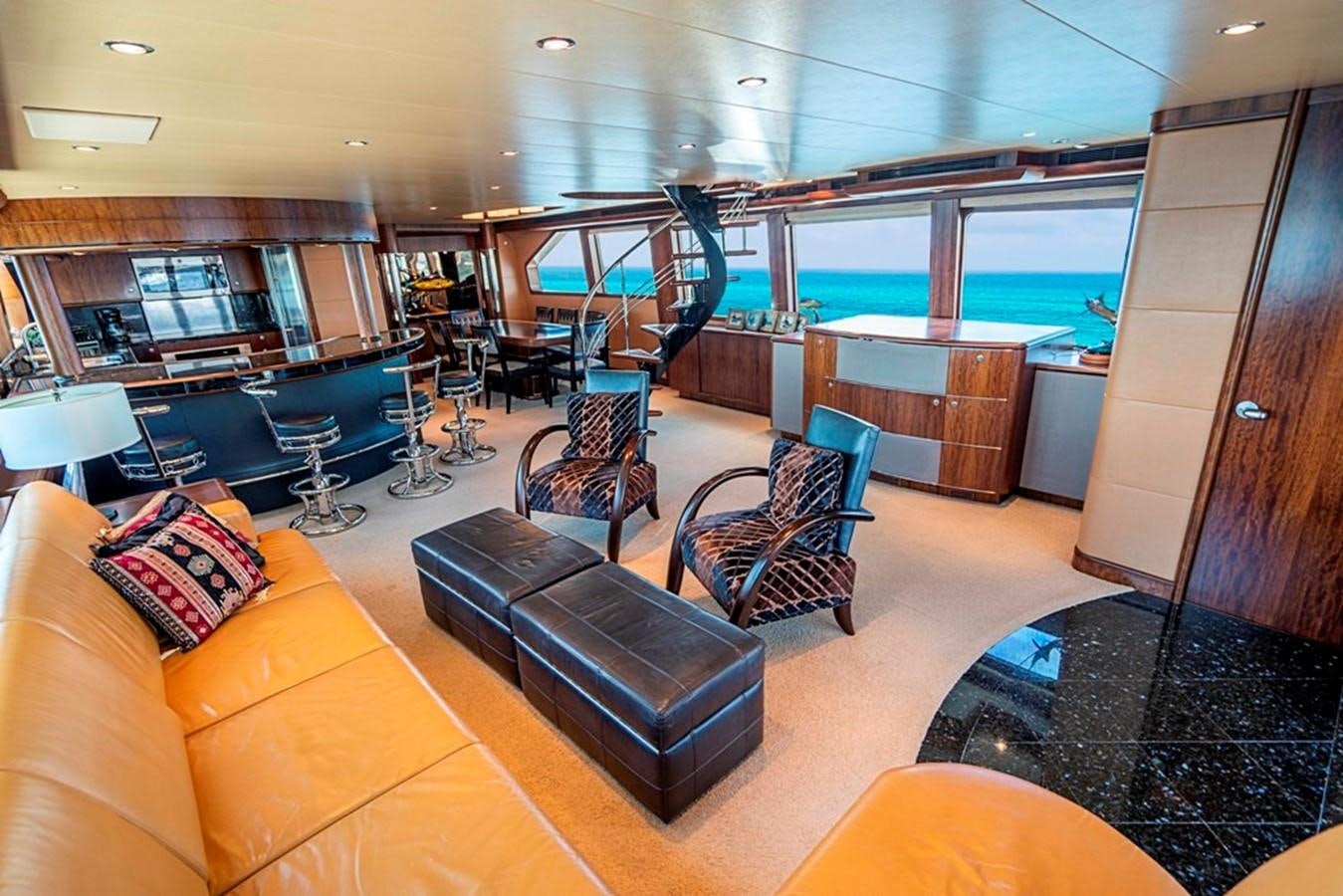a living room with a large glass window aboard GRAND LEGACY Yacht for Sale