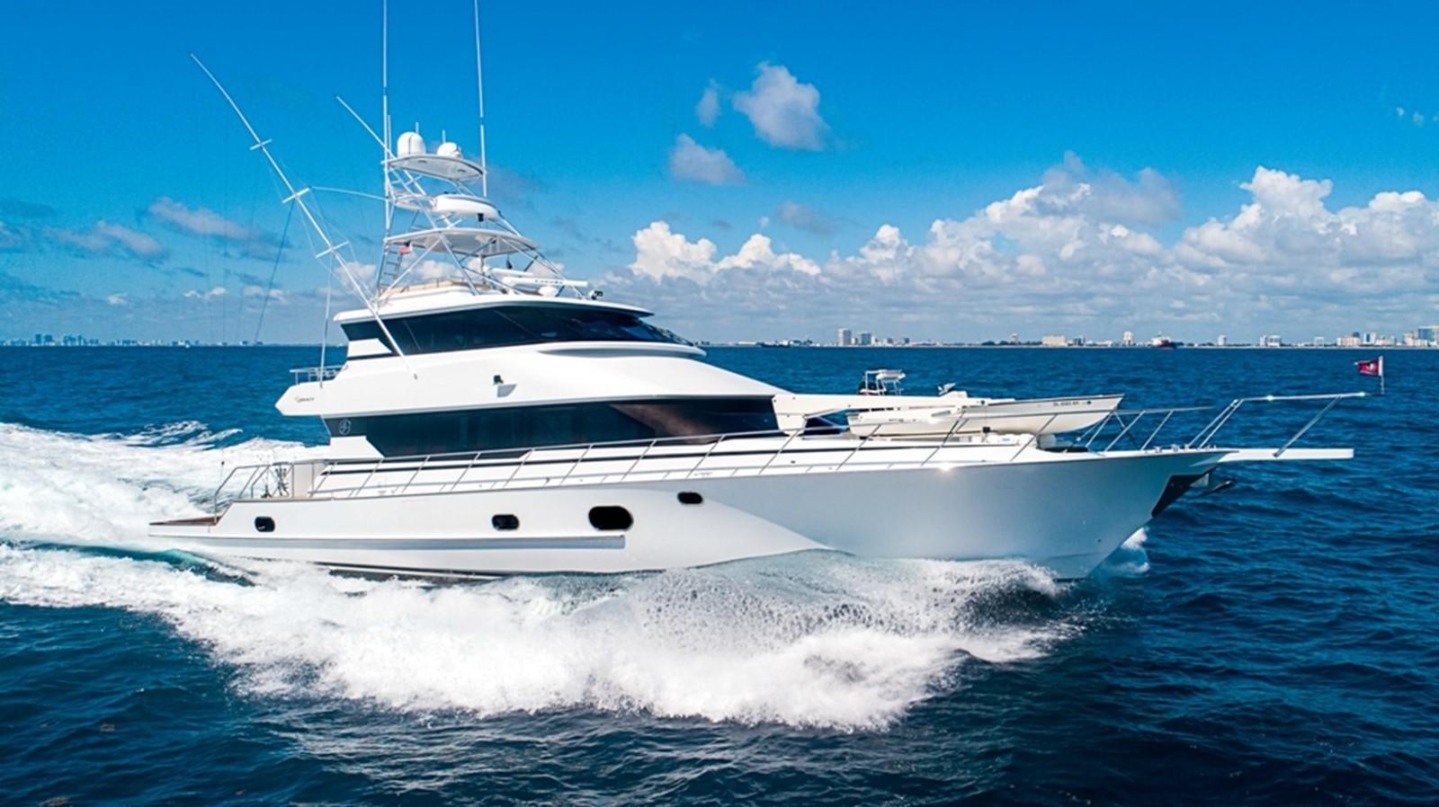 a white yacht on the water aboard GRAND LEGACY Yacht for Sale
