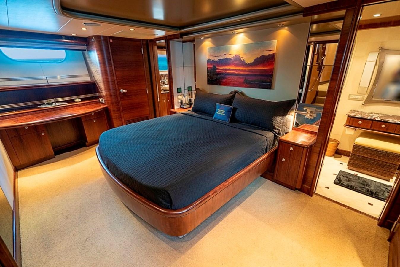 a bed in a room aboard GRAND LEGACY Yacht for Sale