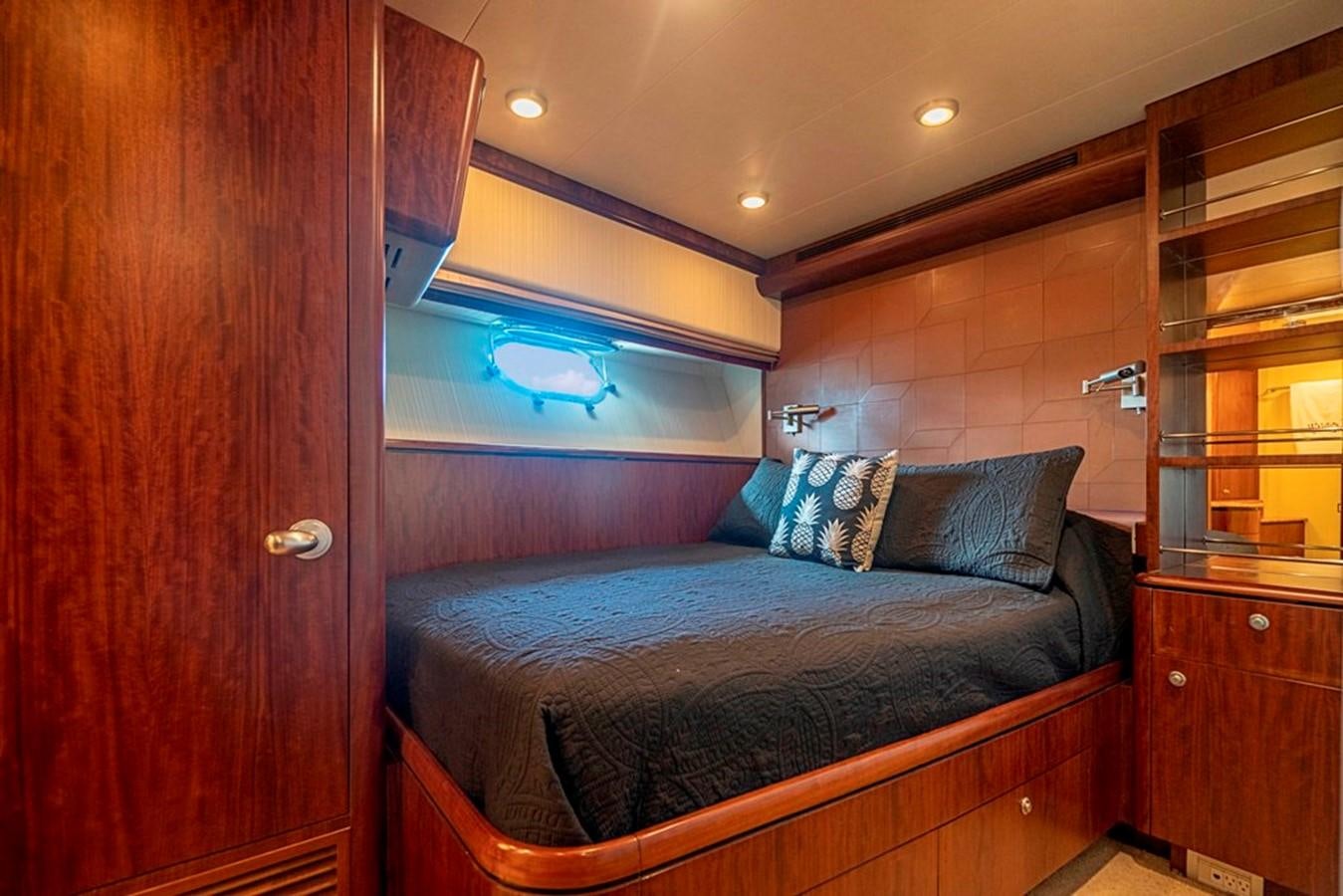 a bed in a room aboard GRAND LEGACY Yacht for Sale