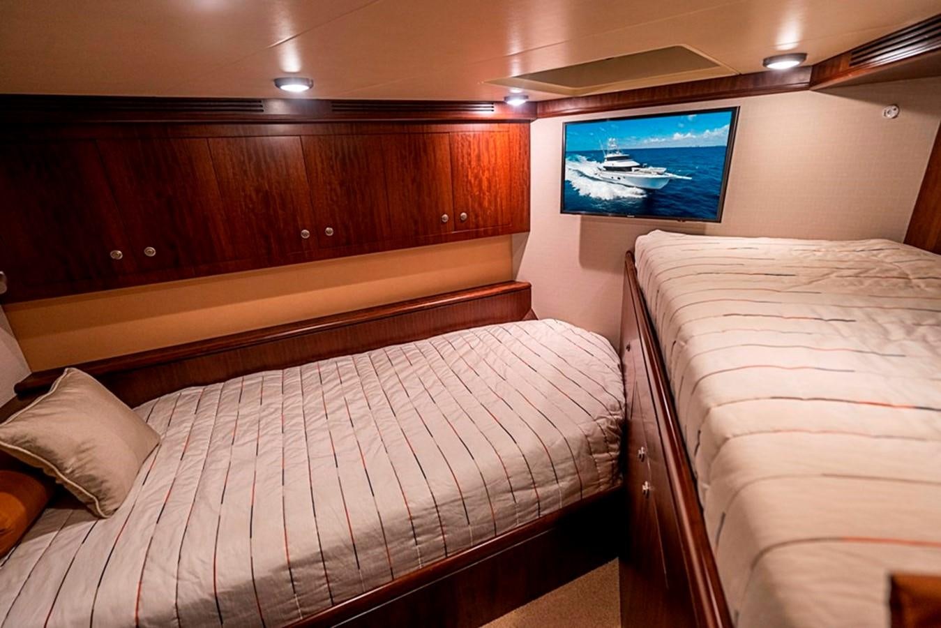 a room with two beds aboard GRAND LEGACY Yacht for Sale