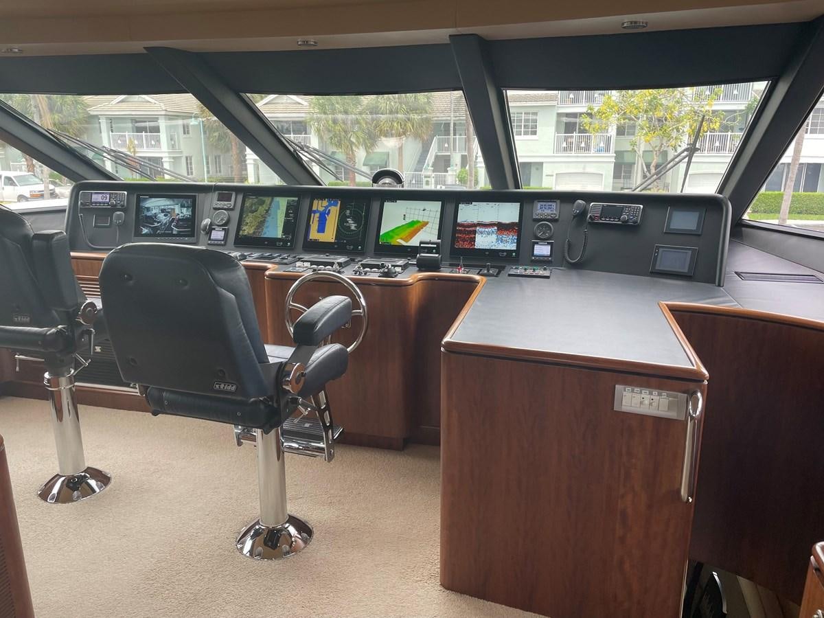 a chair in front of a desk aboard GRAND LEGACY Yacht for Sale