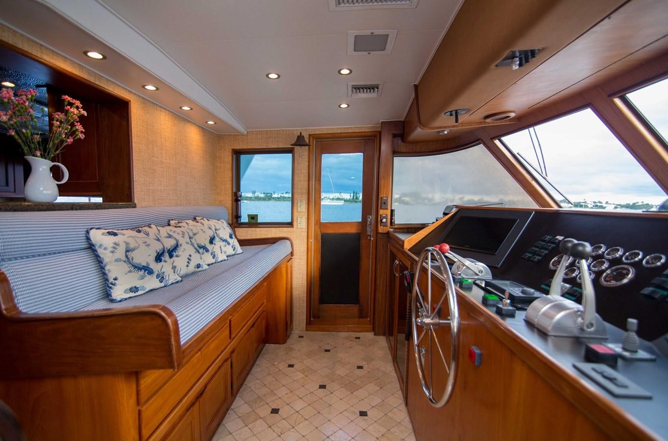 a bedroom with a bed and a desk aboard NEXT DEAL Yacht for Sale