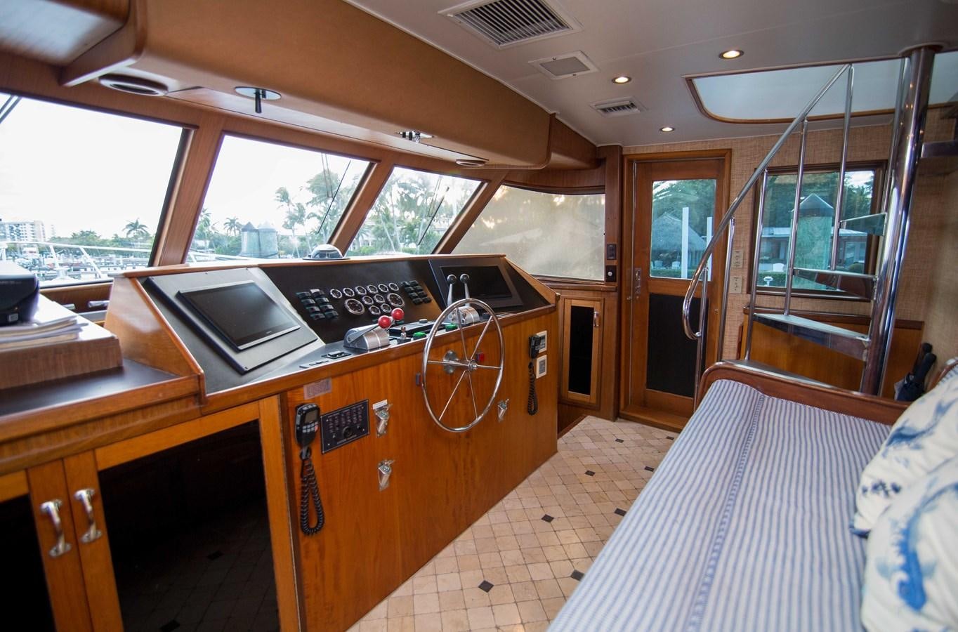 a room with a bed and a desk aboard NEXT DEAL Yacht for Sale