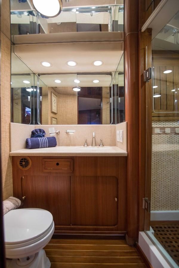 a bathroom with a sink and a toilet aboard NEXT DEAL Yacht for Sale