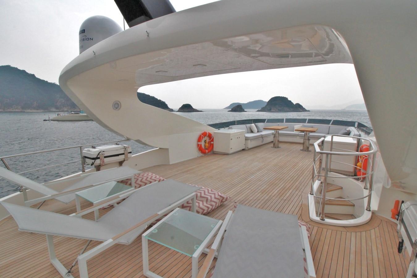 a large white ship docked aboard VERSILCRAFT V86 Yacht for Sale