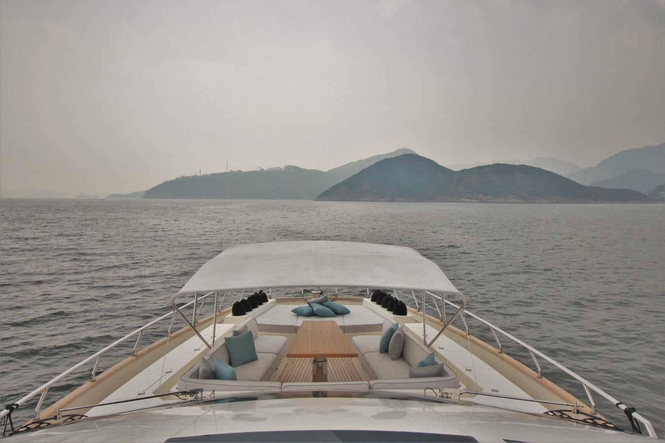 a boat on the water aboard VERSILCRAFT V86 Yacht for Sale