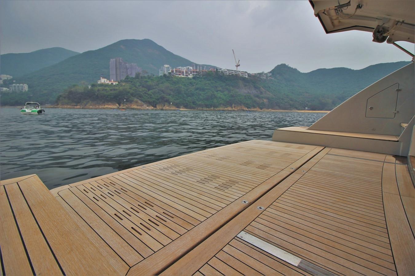 a boat on the water aboard VERSILCRAFT V86 Yacht for Sale