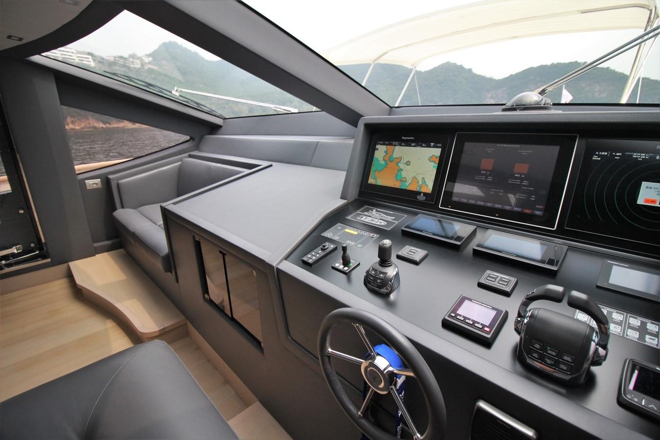 inside of a car aboard VERSILCRAFT V86 Yacht for Sale