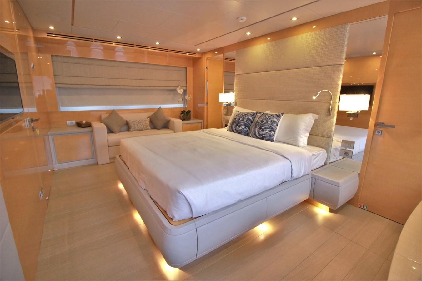 a large bed in a room aboard VERSILCRAFT V86 Yacht for Sale