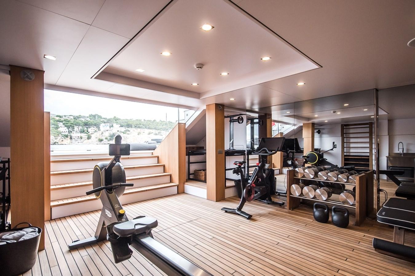 a gym with exercise equipment aboard YXT 27 Yacht for Sale
