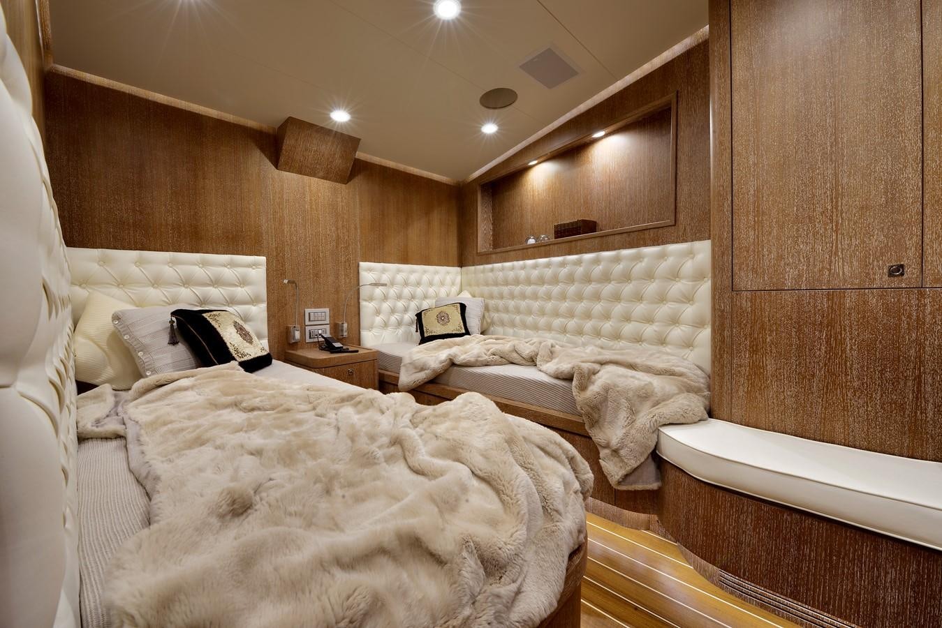 a room with a few beds aboard BULLY Yacht for Sale