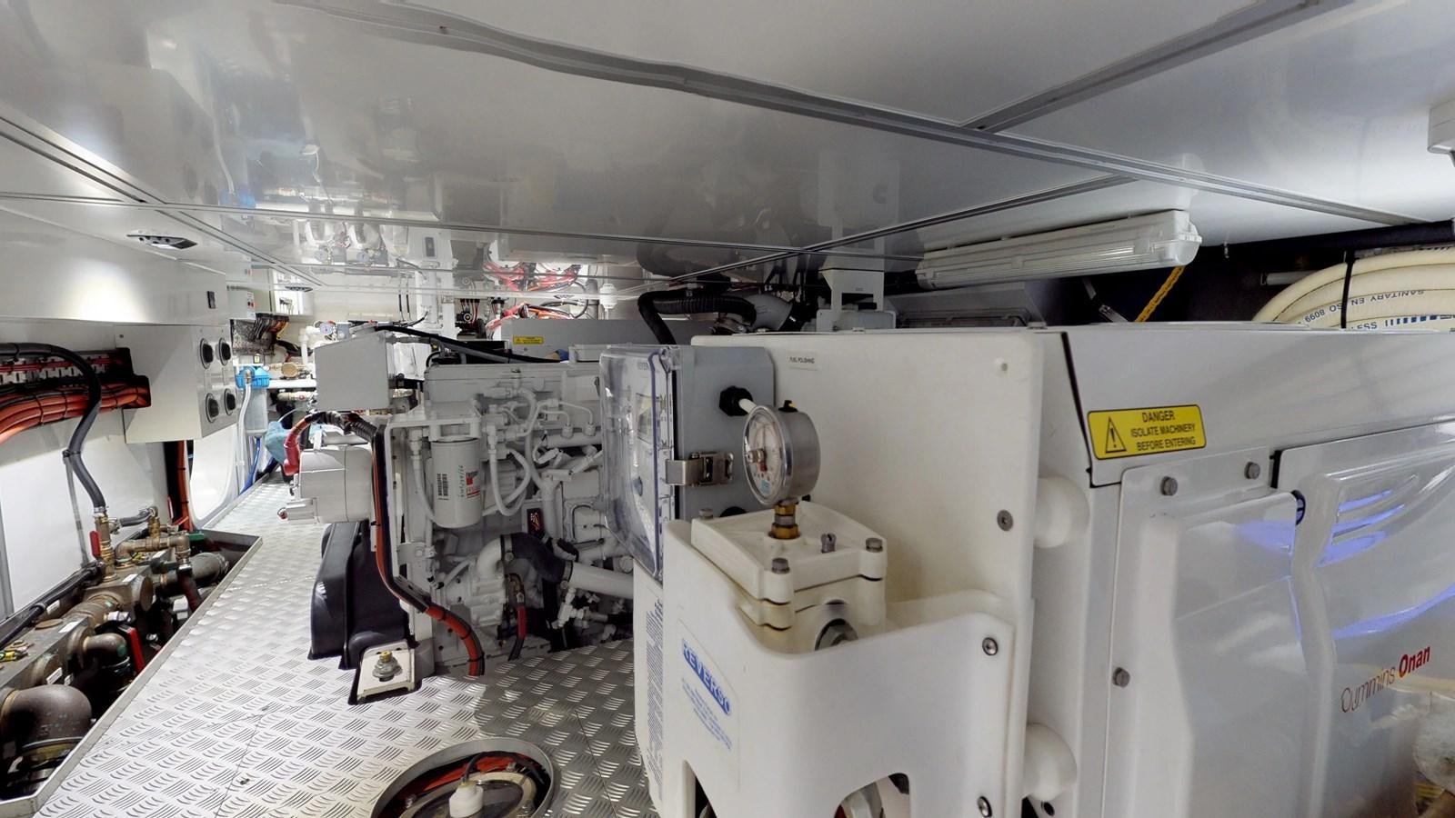 a large white machine aboard AYNI Yacht for Sale