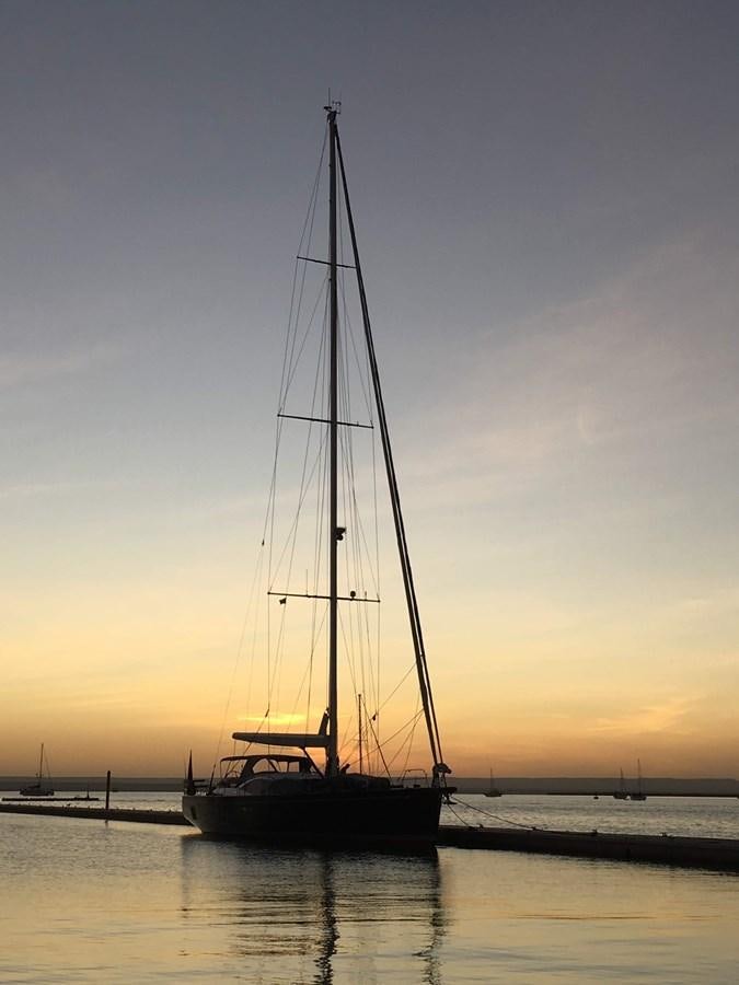 a sailboat on the water aboard AYNI Yacht for Sale