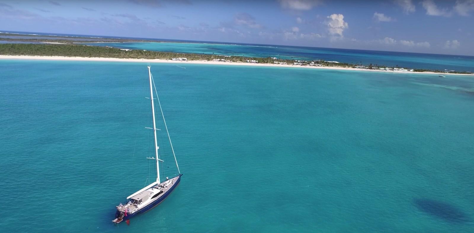 a boat sailing in the sea aboard AYNI Yacht for Sale