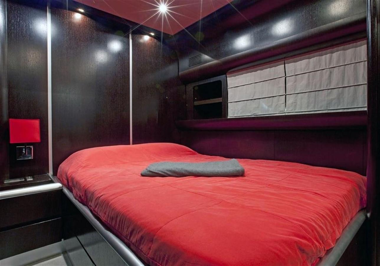 a bed in a room aboard ZAMBOANGA Yacht for Sale