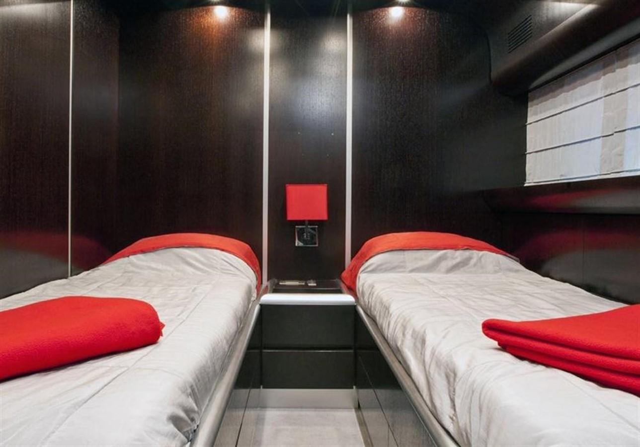 a room with beds and a window aboard ZAMBOANGA Yacht for Sale