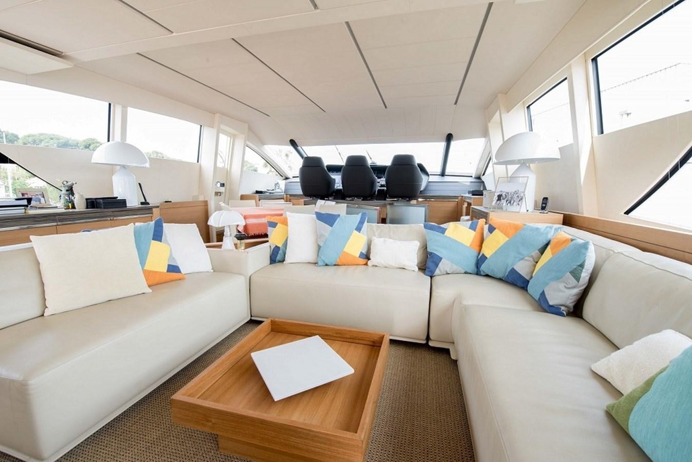 a living room with a couch and a table aboard DORIS V Yacht for Sale
