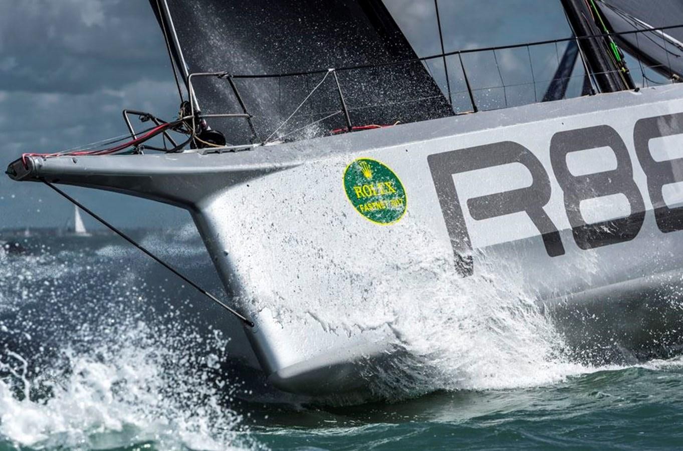 a boat with a flag on it aboard LUCKY Yacht for Sale