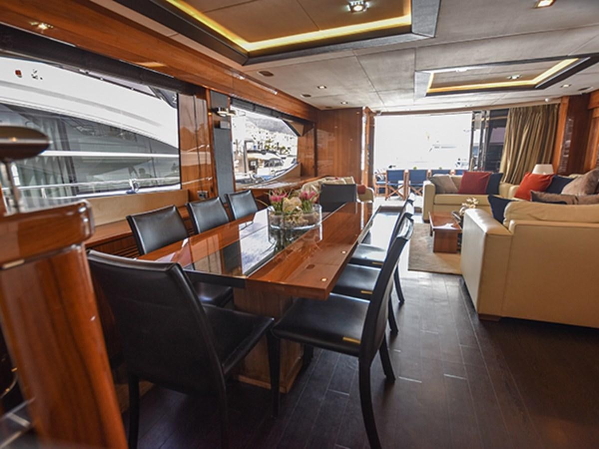 a room with a table and chairs aboard KYRENIA Yacht for Sale