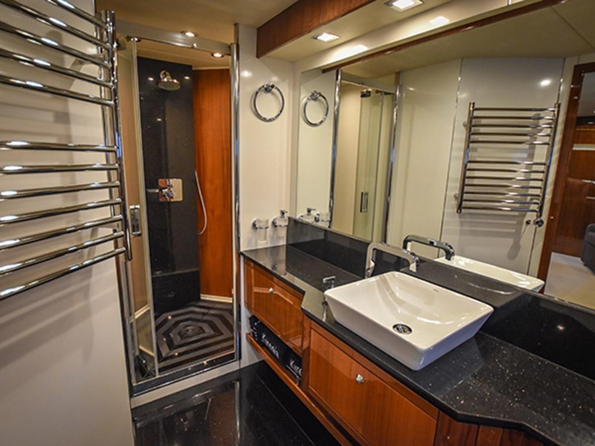 a bathroom with a sink and a shower unit aboard KYRENIA Yacht for Sale
