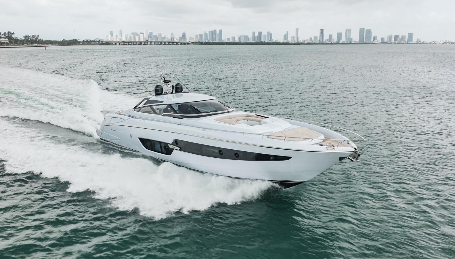 a white yacht on the water aboard AMARA  Yacht for Sale