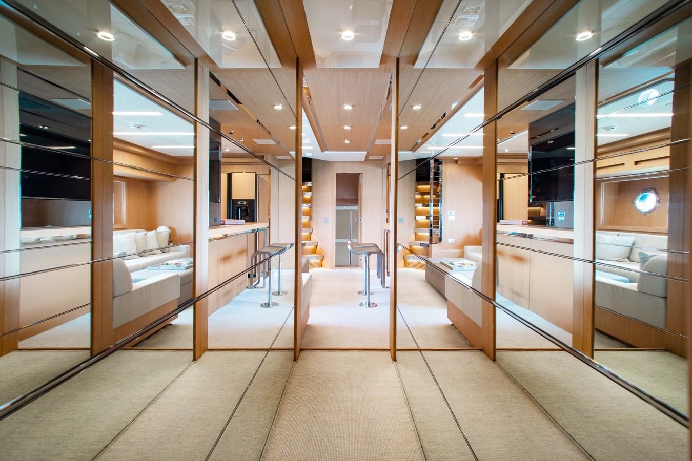 a room with a bed and a desk aboard AMARA  Yacht for Sale