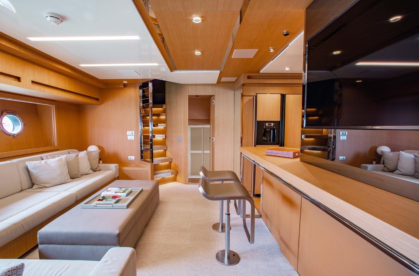a modern looking living room aboard AMARA  Yacht for Sale